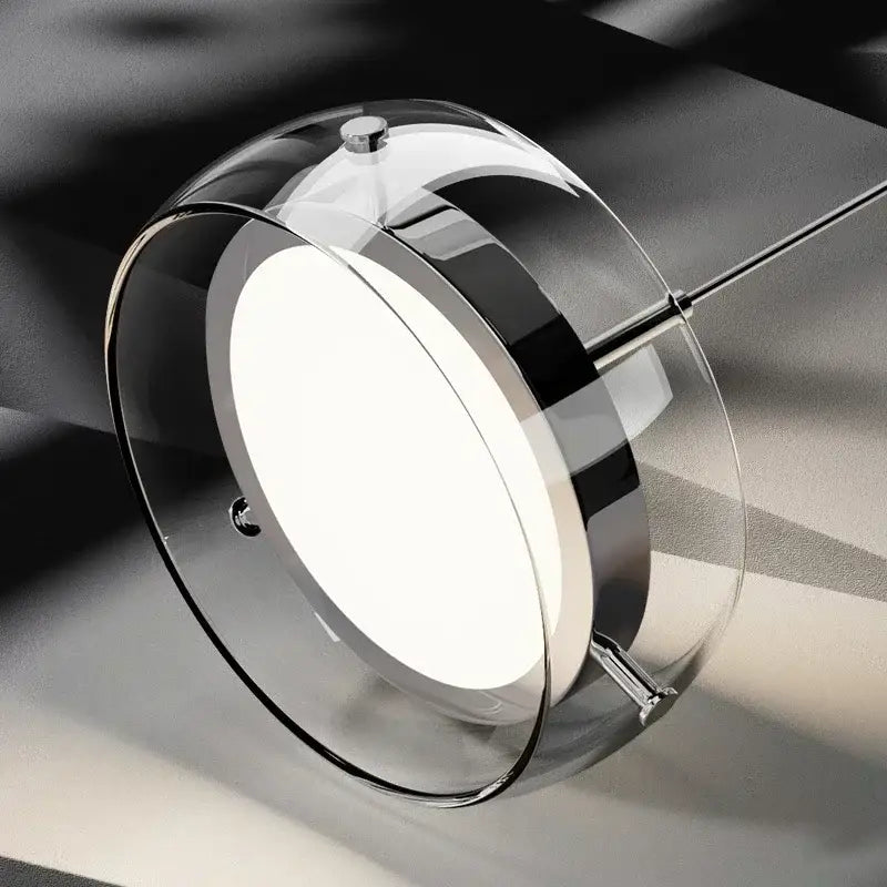 Modern minimalist chrome and glass dining pendant light with circular design and frosted glass diffuser for decorbites glass dining
