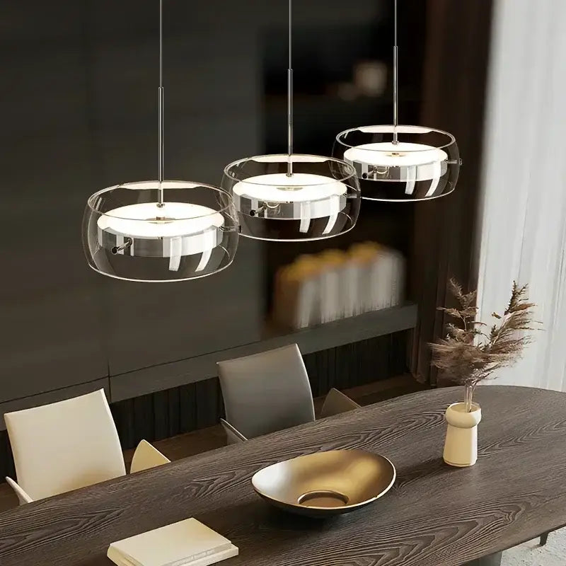 Modern minimalist chrome and glass dining pendant light with clear glass shades and polished chrome frames for decorbites glass dining