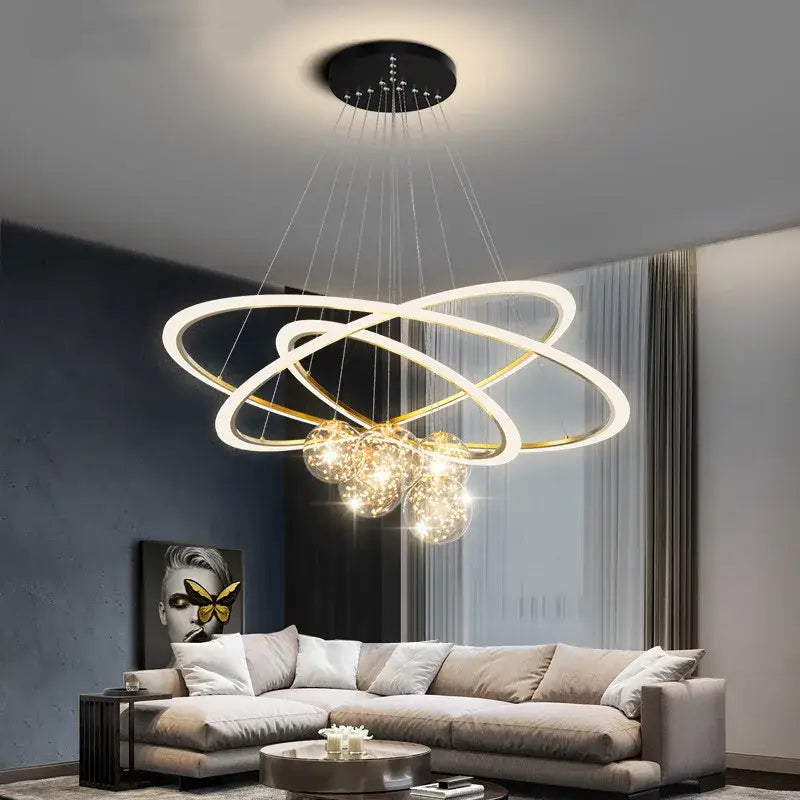 Modern minimalist circle ring pendant light with interlocking gold and white rings and glowing bulbs for bedroom decorbites circle ring chandelier