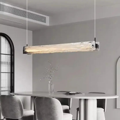 Modern minimalist cloud fog glass pendant light with textured translucent fog glass and metallic ends for dining room