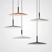 Modern minimalist colorful ufo pendant lights with sleek disc-shaped matte shades in orange gray white and black for dining room decorbites colorful ufo pendant