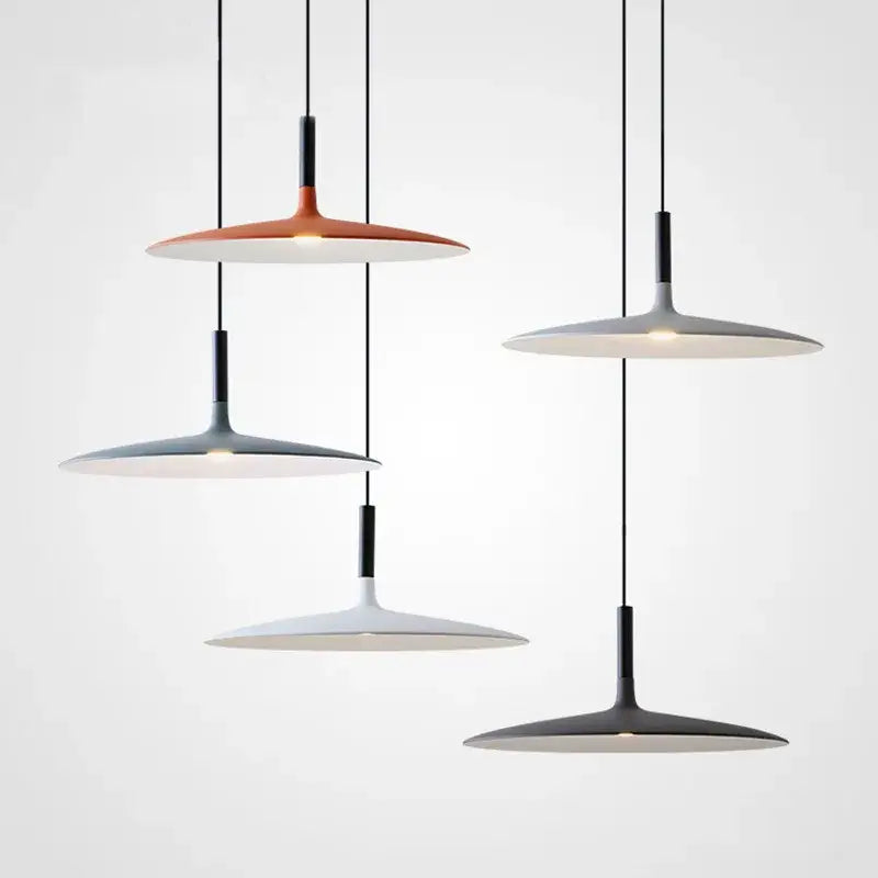 Modern minimalist colorful ufo pendant lights with sleek disc-shaped matte shades in orange gray white and black for dining room decorbites colorful ufo pendant
