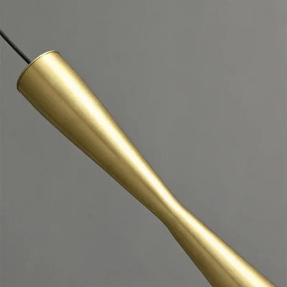 Golden brass pendant light with sleek tapered design and polished finish for modern minimalist dining room decorbites copper black gold