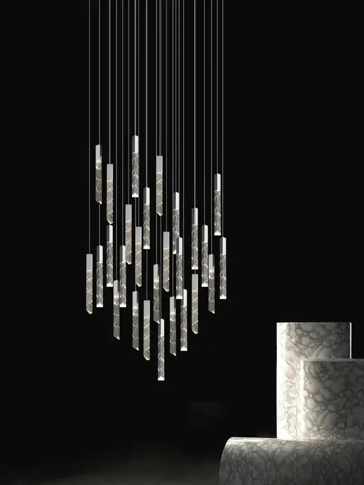 Modern minimalist silver-toned pendant light with slender etched crystal led pendant tubes for living room decorbites crystal led