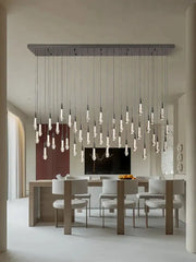 Modern minimalist ceiling chandelier with clear glass bulbs and metallic bar for dining room decorbites crystal water-drop design