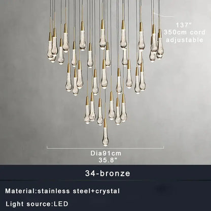 A modern ceiling chandelier with teardrop crystal pendants and bronze-finished stainless steel cords for dining room decorbites crystal water-drop