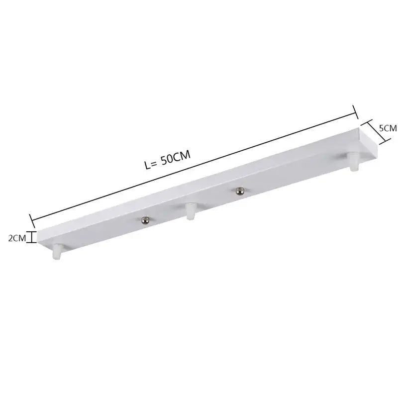 White rectangular wall-mounted coat rack with three metallic hooks complements decorbites ceiling chandelier plate