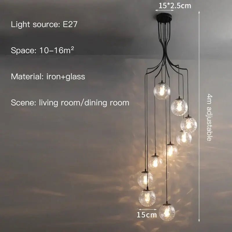 Black iron and glass decorbites glass ball pendant chandelier with multiple spherical bulbs for modern minimalist decor