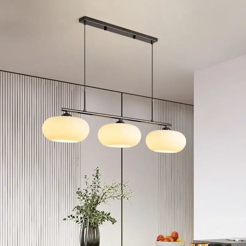 Modern black metal decorbites glass chandelier with three warm frosted glass globe shades for living room pendant light