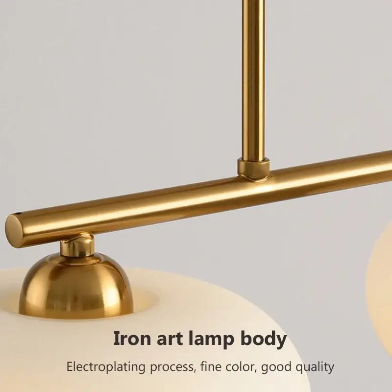 Modern minimalist decorbites glass chandelier with gold-finished iron art lamp body and smooth electroplated surface