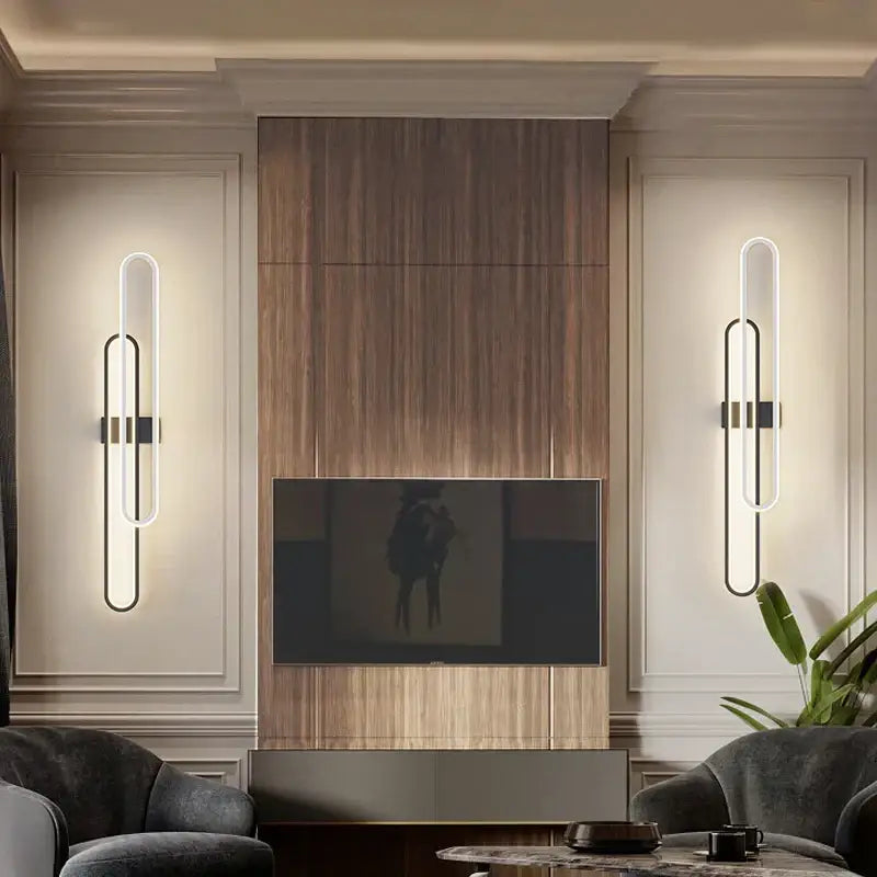 Modern minimalist decorbites led wall lights with sleek black metal frames and glowing white led lighting for bedroom sconce