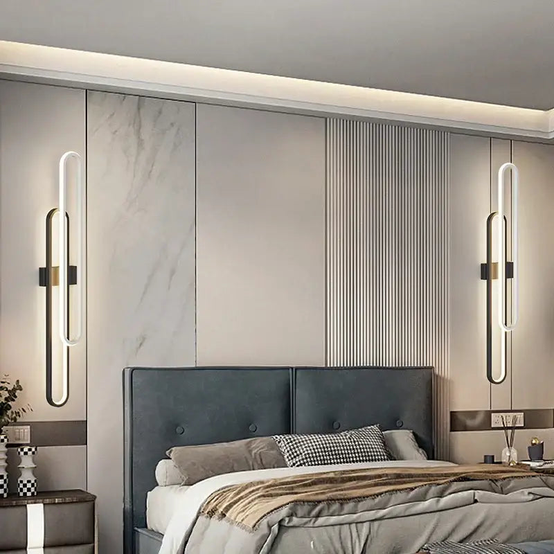 Modern minimalist decorbites led wall sconce with sleek curved white acrylic and black metal frame for bedroom lighting
