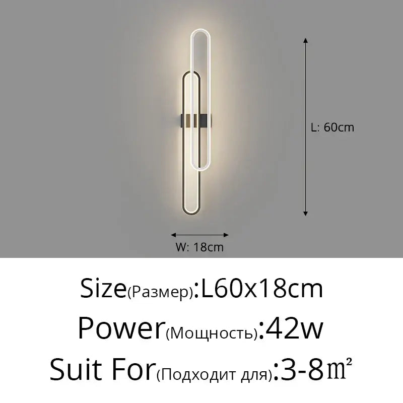 Modern minimalist decorbites led wall sconce with sleek white and black illuminated paperclip design for bedroom lighting