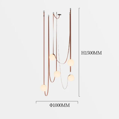 A modern minimalist copper-toned pendant light with five frosted glass ball bulbs for dining room decorbites