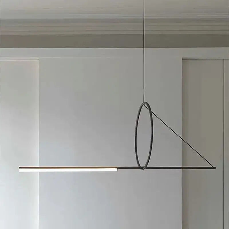 Minimalist black metal pendant light with circular ring and linear led bar from decorbites geometric chandelier collection