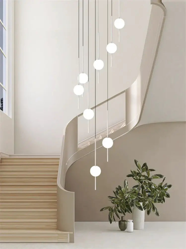 Modern minimalist glass ball led ceiling chandelier with white glass globes and metallic rods for dining room decorbites glass ball