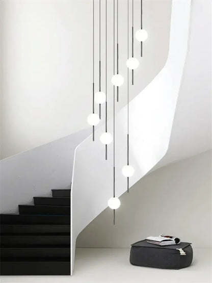 Modern minimalist glass ball led ceiling chandelier with white spherical glass bulbs and black rods for dining room decorbites glass ball