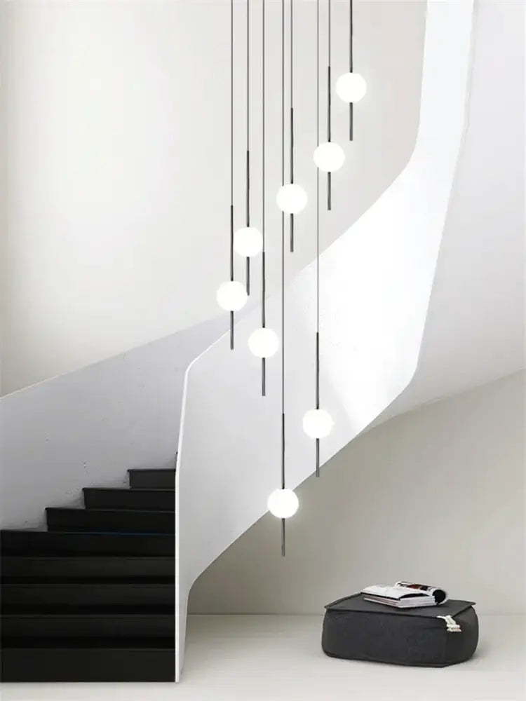 Modern minimalist glass ball led ceiling chandelier with white spherical glass bulbs and black rods for dining room decorbites glass ball