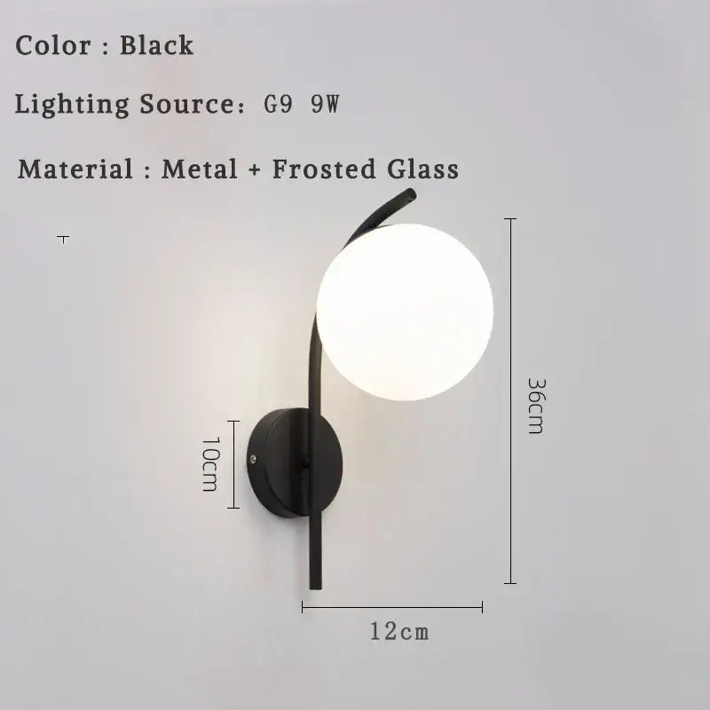 Black metal and frosted glass led wall lamp with a curved arm and spherical light for modern minimalist bedroom use