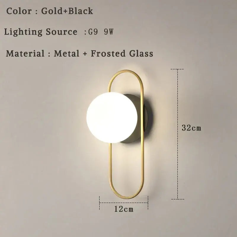 Modern minimalist gold-toned led wall lamp with frosted glass and sleek oval frame for bedroom sconce lighting