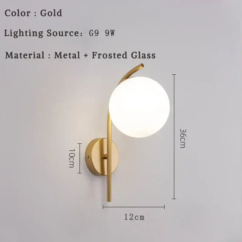 Gold-toned led wall lamp with sleek metal arm and frosted glass globe modern minimalist bedroom sconce