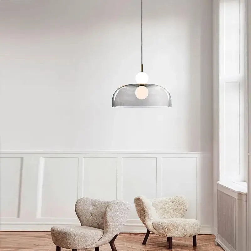 Modern minimalist glass ball pendant light with translucent gray glass dome and dual bulbs for living room decorbites pendant light