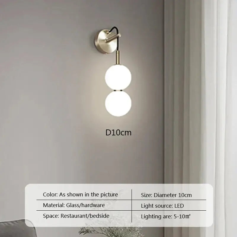 Modern brass-finished glass ball pendant light with two frosted spheres for living room decorbites glass ball decor