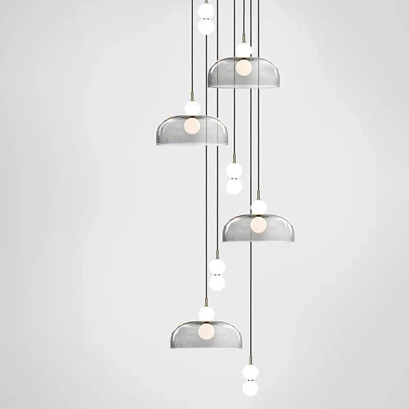 Modern minimalist pendant light with translucent gray glass ball domes and white bulbs by decorbites for living room decor