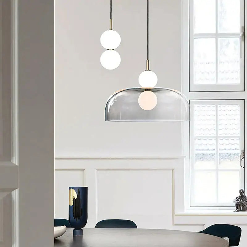 Modern minimalist glass ball pendant light with frosted glass spheres and transparent dome shade for living room decorbites glass ball pendant