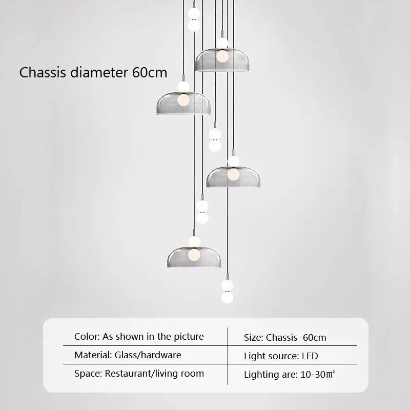 Modern minimalist glass ball pendant light with translucent gray glass shades and sleek metallic hardware for living room decorbites glass ball pendant