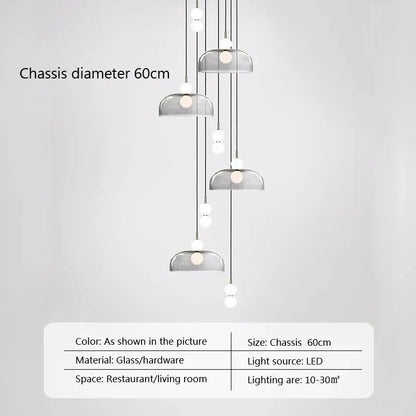 Modern minimalist pendant light with tiered translucent gray glass ball shades and sleek metallic hardware for living room decorbites glass ball
