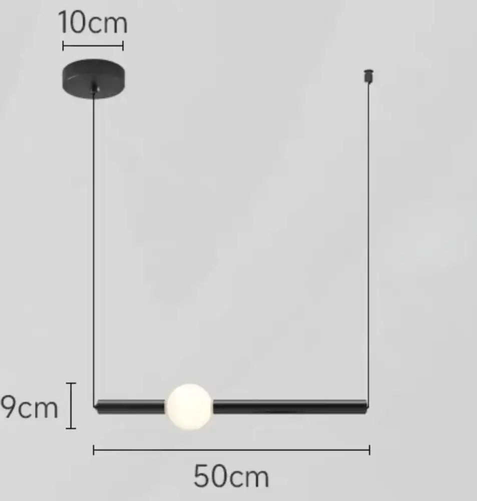 Modern minimalist black glass rod pendant light with a sleek cylindrical rod and white spherical bulb for living room