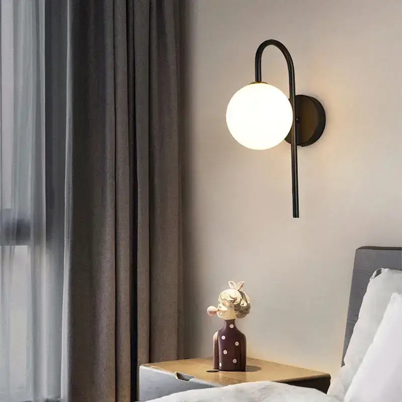 Modern black metal wall lamp with frosted glass globe shade from decorbites glass gold led collection for bedroom decor