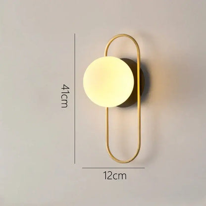 Modern minimalist gold and black glass gold led wall lamp with gold-toned metal frame and frosted glass shade for decorbites wall lamp