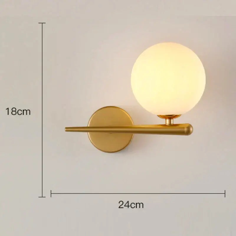 Modern minimalist gold and black wall lamp with decorbites glass gold led frosted globe for bedroom decor