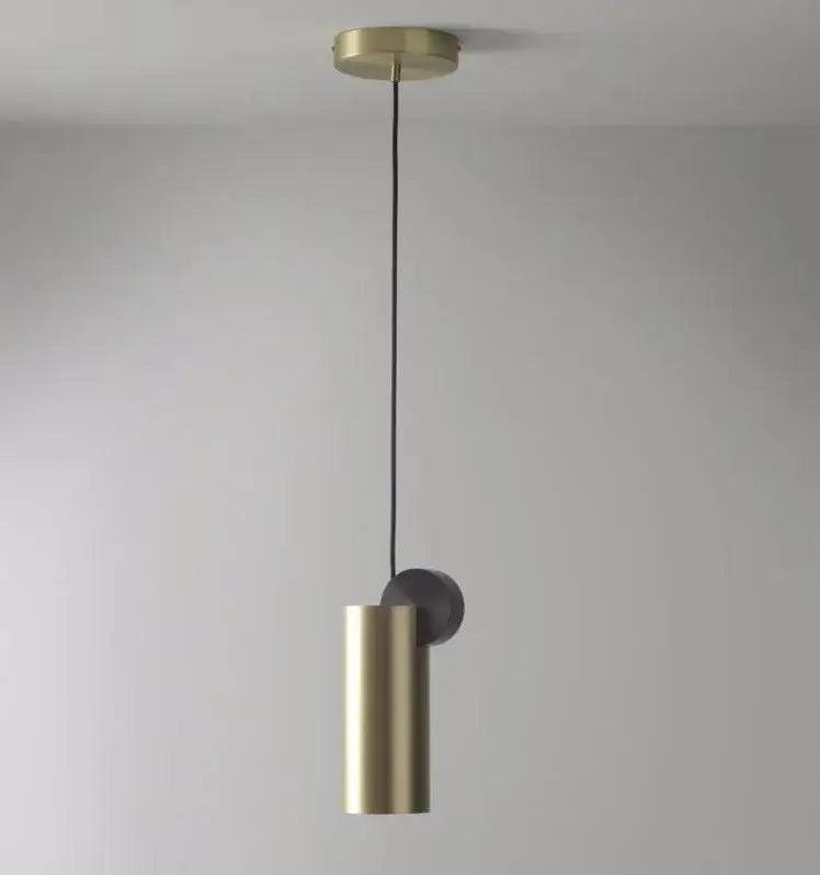 A modern minimalist golden led pendant light with brass cylindrical body and matte black accent for dining room decorbites