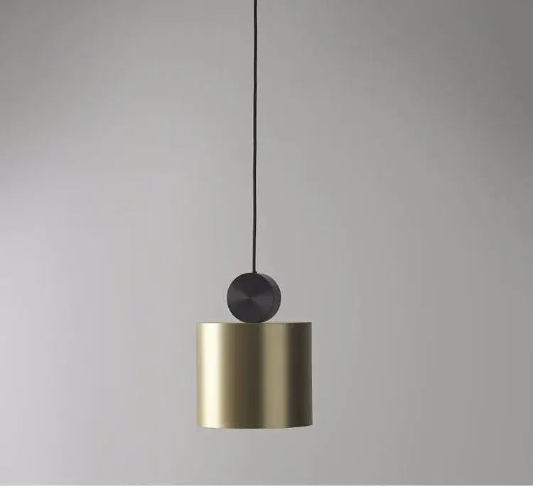 Modern minimalist golden led pendant light with cylindrical brass body and matte black top for dining room decorbites pendant light