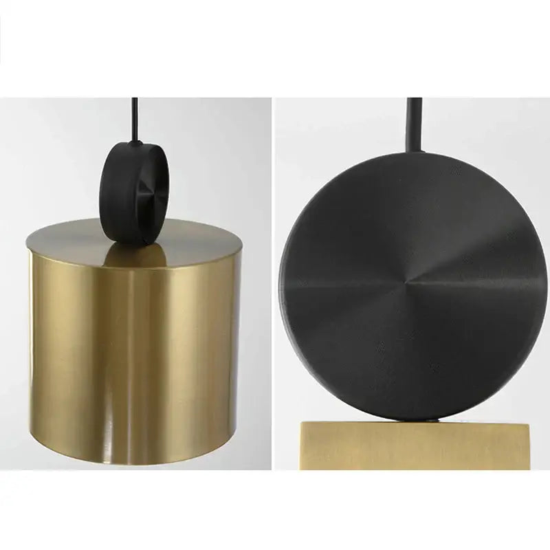 Modern minimalist golden led pendant light with cylindrical brass body and black matte shade for dining room decorbites pendant light