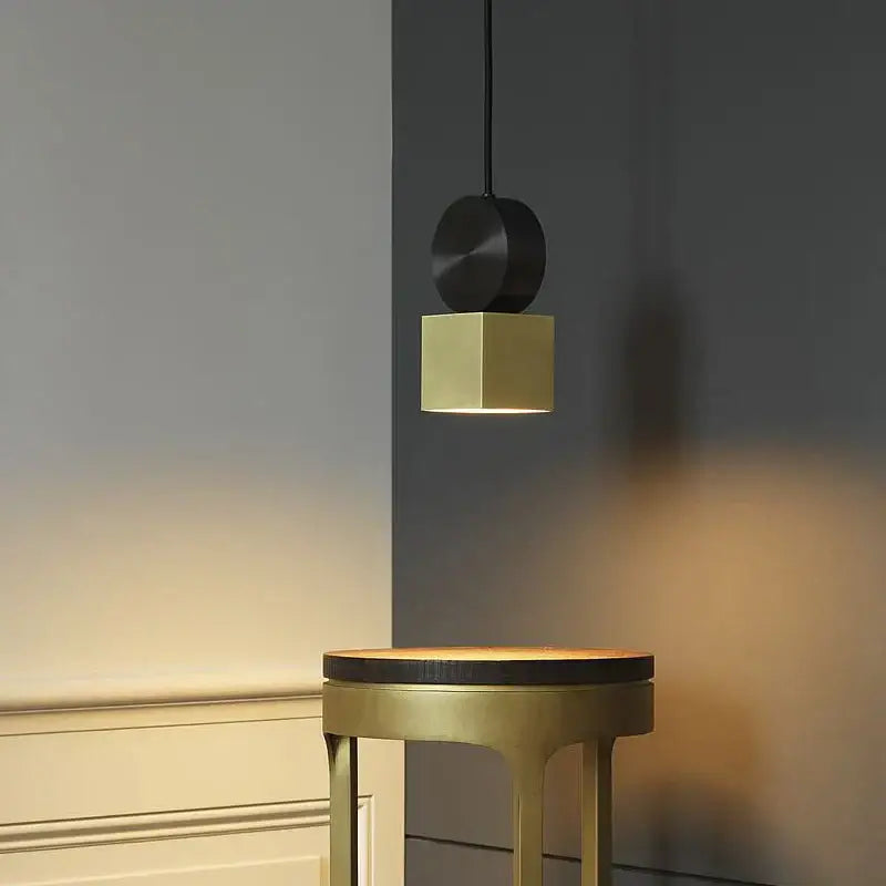 Modern black and gold geometric pendant light with circular top and square base for dining room decorbites golden led pendant