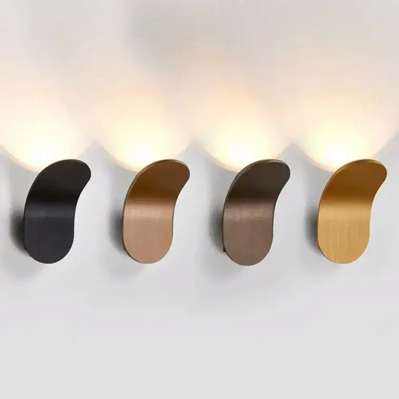 Modern minimalist gold and black led wall lamps with sleek curved metal finishes for living room wall lamps