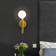 Modern minimalist yellow wall lamps with decorbites glass ball and geometric design for bedroom lighting