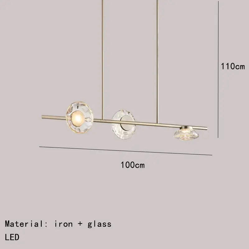 Modern minimalist gold glass led chandelier with a sleek iron frame and three faceted crystal glass led shades