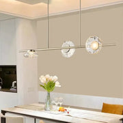 Modern minimalist gold glass led chandelier with three crystal glass shades suspended from metallic rod for dining room