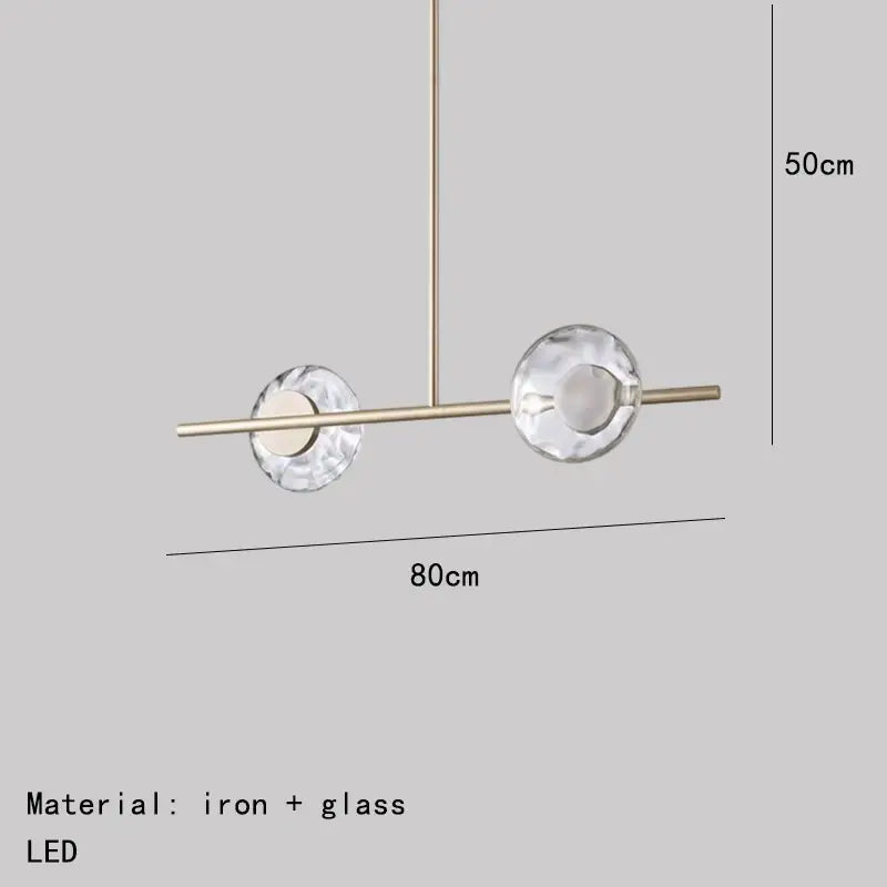 Modern minimalist gold glass led chandelier with sleek brass iron frame and two faceted clear glass spheres for dining room