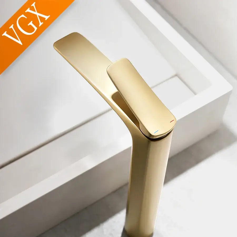Modern minimalist gold high basin mixer faucet with sleek tall spout for cold water in bathroom basin