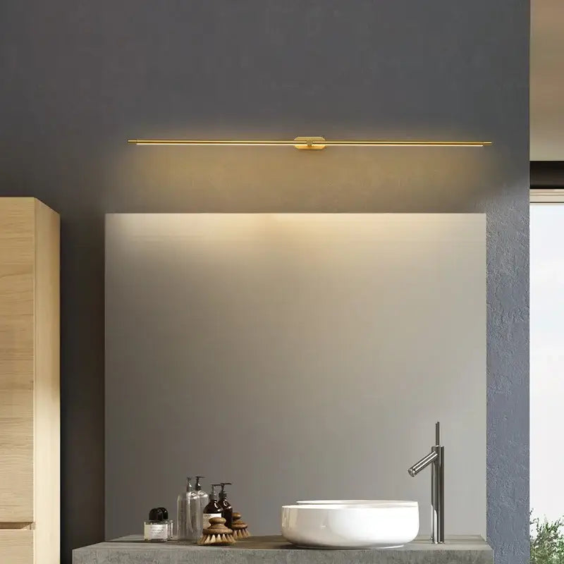 Modern minimalist gold led mirror light with a sleek linear design for bathroom wall fixture illumination