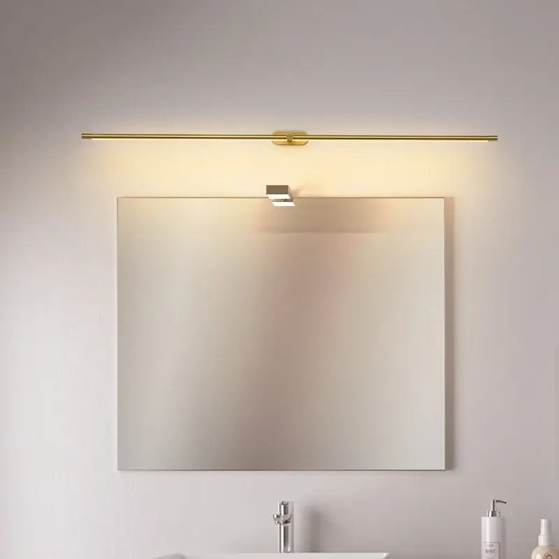 Gold-toned linear modern minimalist led mirror light bathroom wall fixture with sleek minimalist design and gold finish
