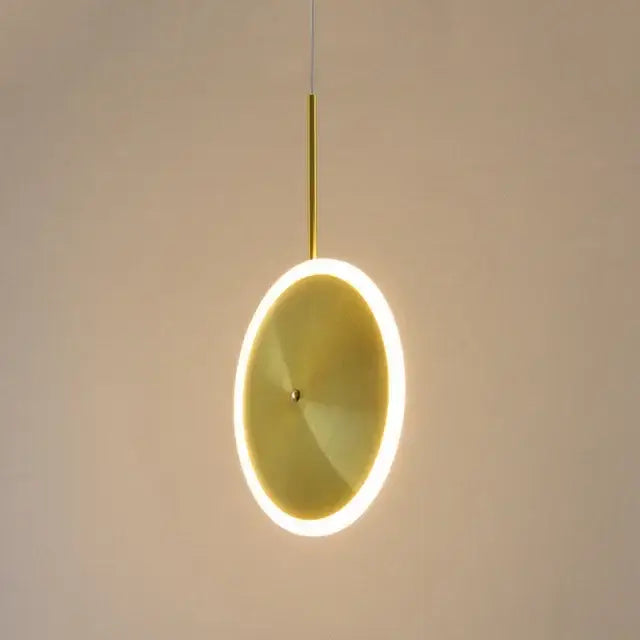 Modern minimalist gold led pendant light with a glowing led ring and sleek metallic finish for kitchen island decorbites gold led