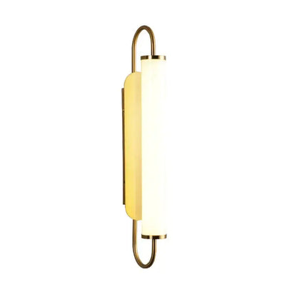Gold-toned modern minimalist led wall lamp with frosted glass cylinder and curved metal frame for bedroom use