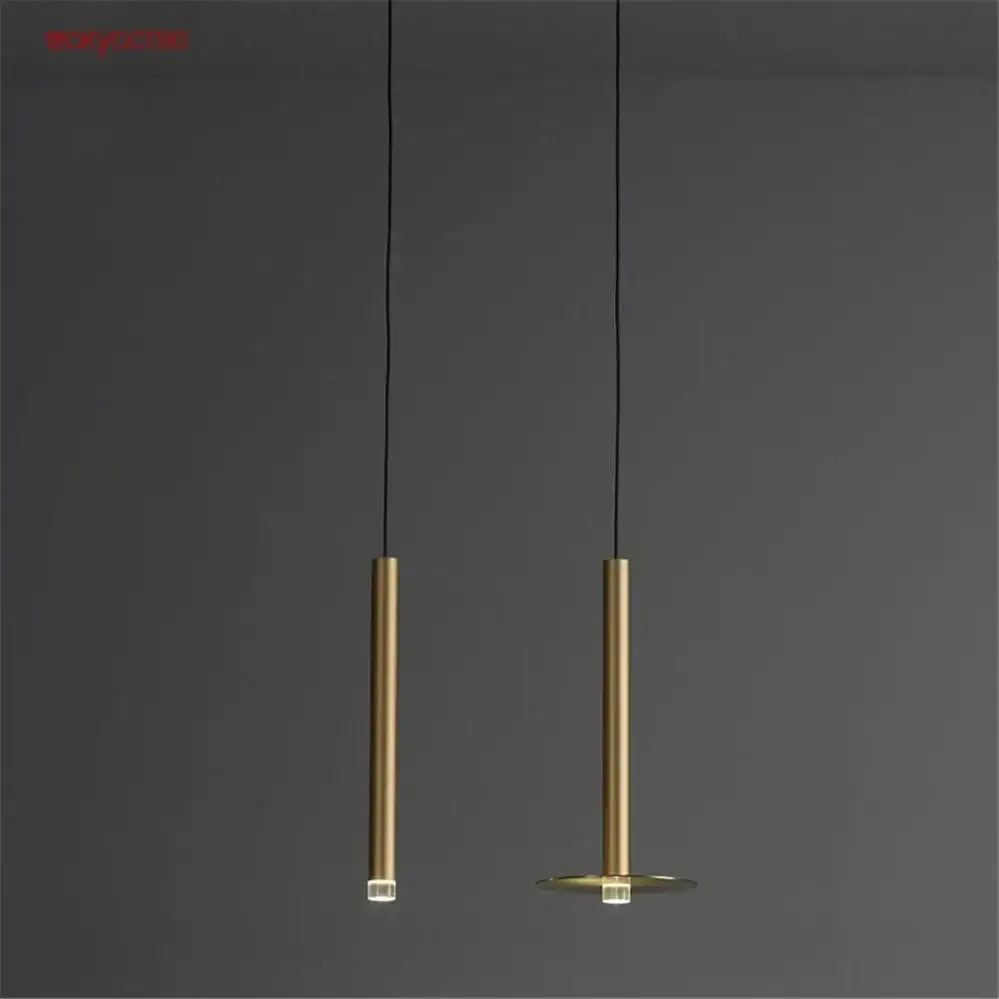Two minimalist brass decorbites gold tube led pendant lights with cylindrical bodies for kitchen dining room decor